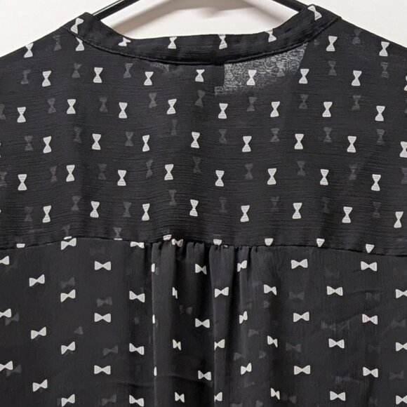 Torrid Bow Print Ruffle Front Blouse in Black & White - Picture 6 of 11